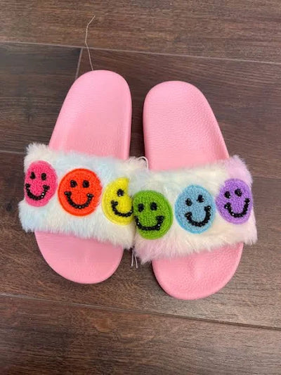 Pink Slippers with a Happy Face A Fusion of Comfort and Joy