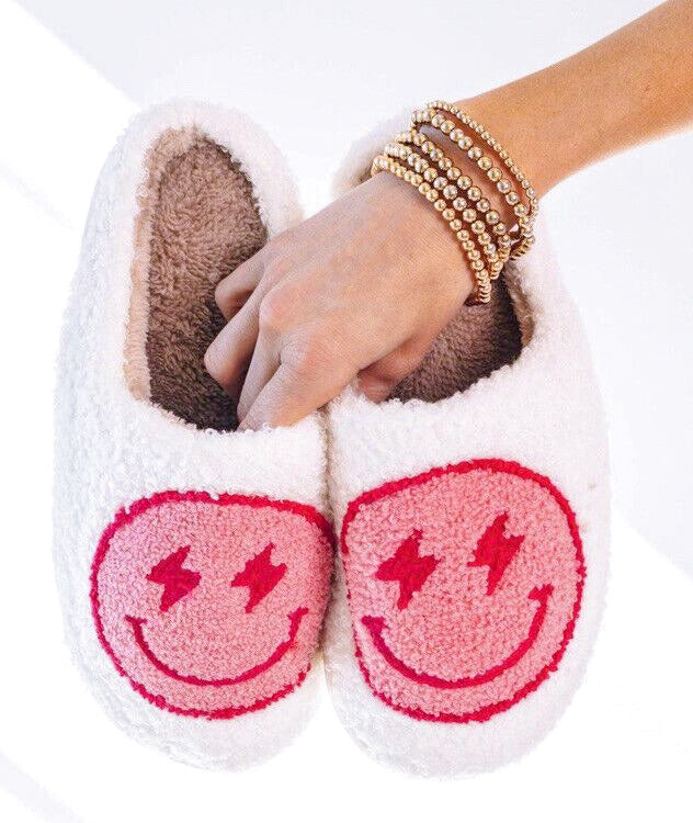 Pink Slippers with a Happy Face A Fusion of Comfort and Joy