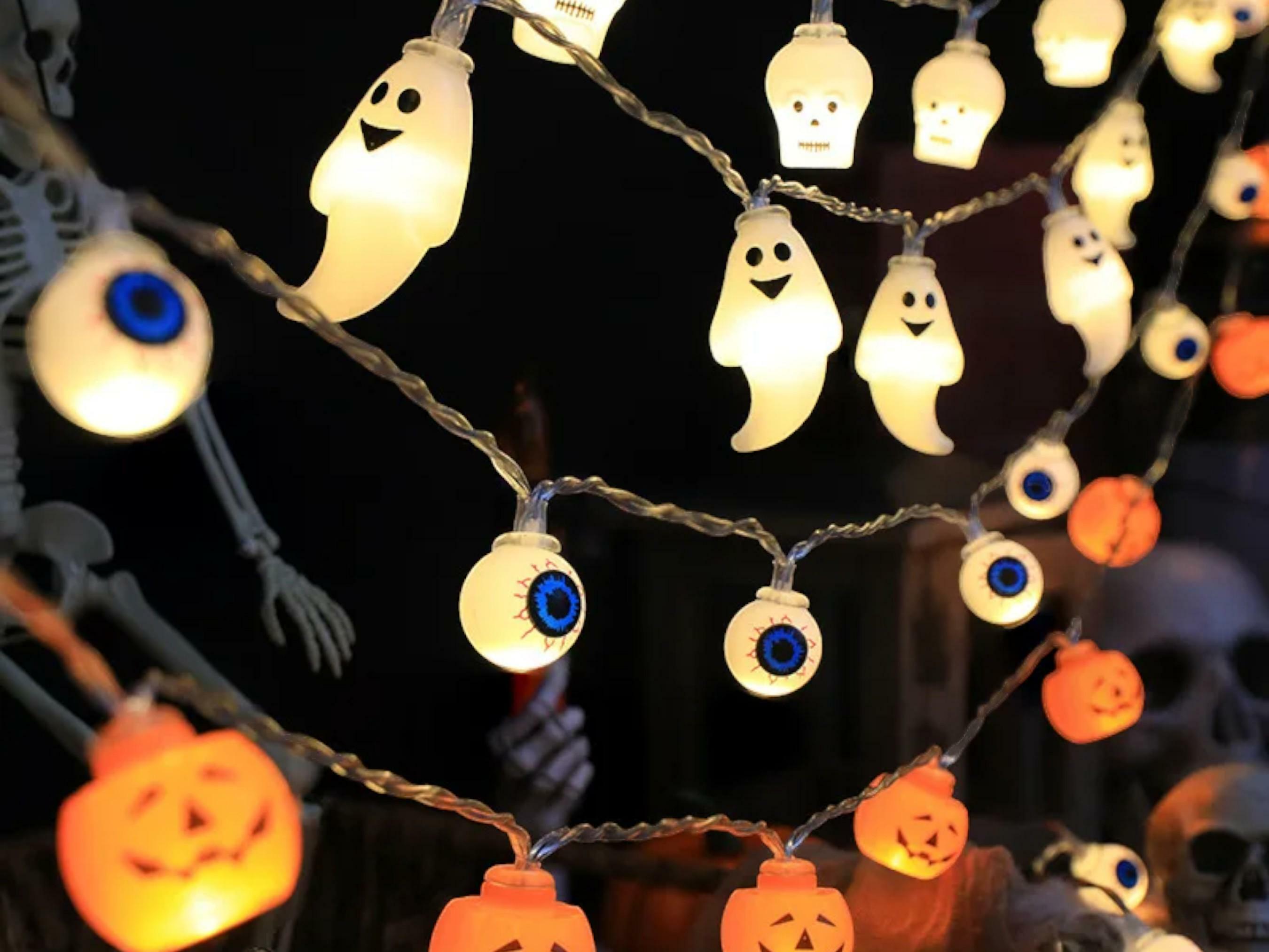 Spooky Halloween LED Lanterns - Pumpkin, Skull, and Eyeball String Lights for Festive Decor